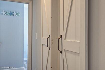 24 Sanders Road Wilmington, NC 28412 - Photo 13 of 28 Sliding barn doors...