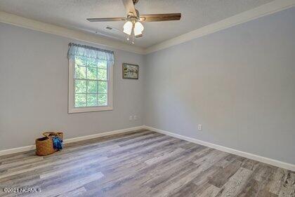 24 Sanders Road Wilmington, NC 28412 - Photo 17 of 28 Another view of primary bedroom.