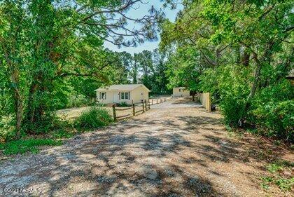 24 Sanders Road Wilmington, NC 28412 - Photo 28 of 28 Long driveway can accommodate multiple cars.