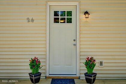 24 Sanders Road Wilmington, NC 28412 - Photo 6 of 28 Side entrance off deck.