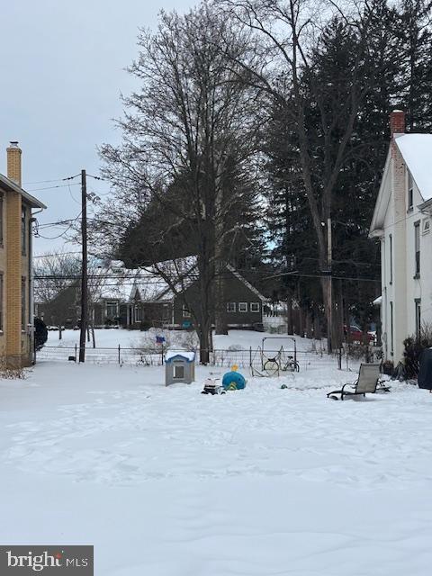 a view of pool table and chairs
