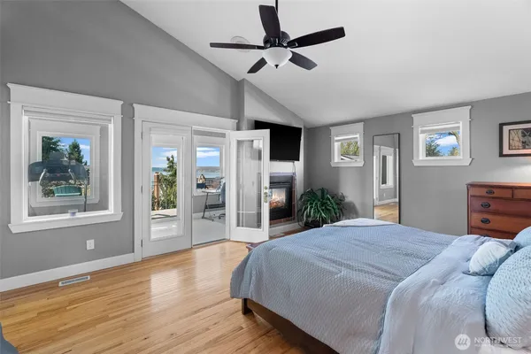 a view of a workspace with furniture and a gate