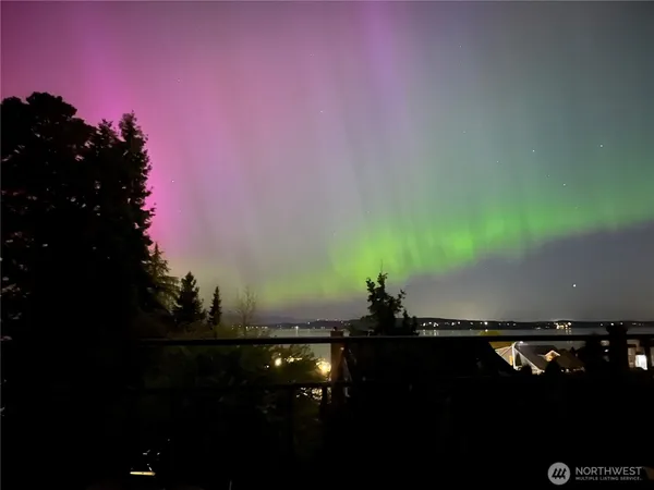 a bathroom with a shower and a sink