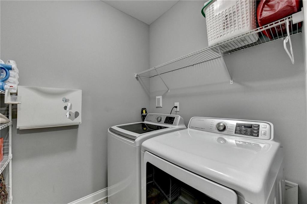 4071 Woodward Walk Lane Suwanee, GA 30024 - Photo 28 of 50 a utility room with dryer and washer