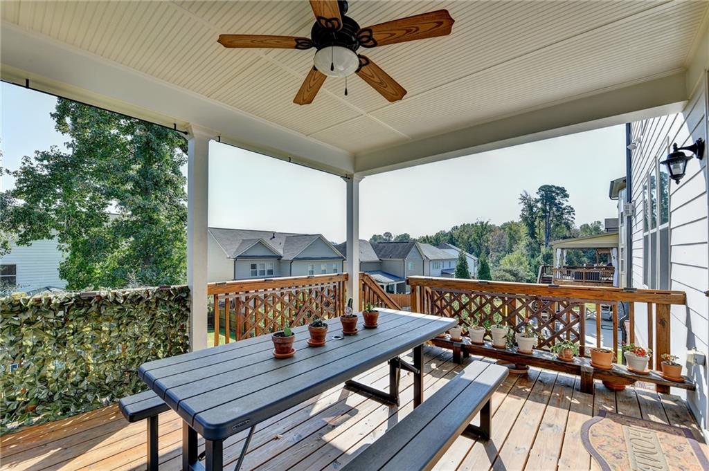 4071 Woodward Walk Lane Suwanee, GA 30024 - Photo 43 of 50 a view of a balcony with furniture