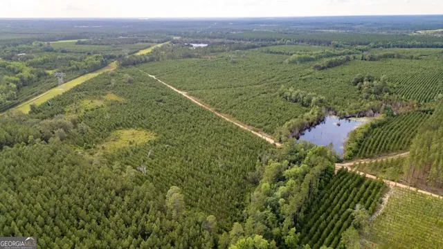 a view of a field with an outdoor space