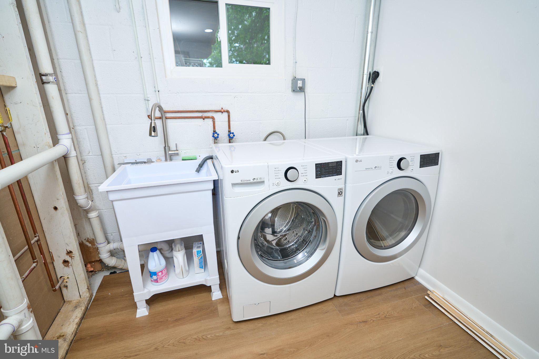 4507 Picot Road Alexandria, VA 22310 - Photo 24 of 28 Modern laundry space with sleek appliances.
