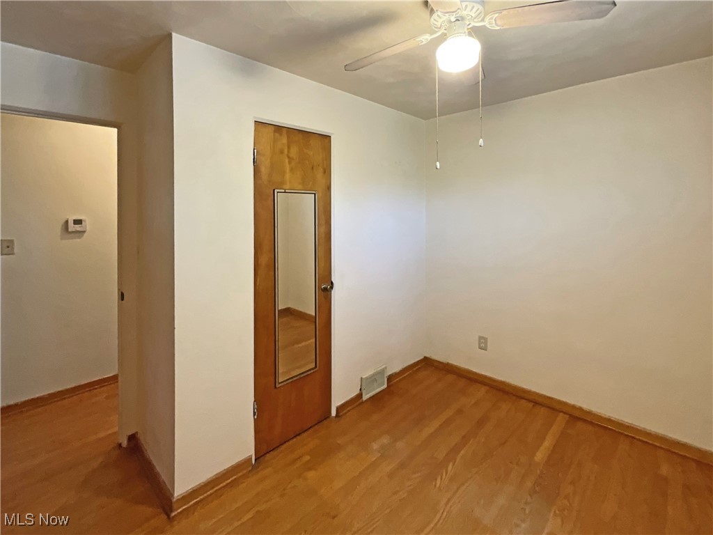 106 Ridgeway Avenue Weirton, WV 26062 - Photo 9 of 19 Empty room with light hardwood / wood-style flooring and ceiling fan