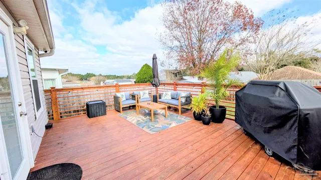 a view of a terrace with furniture