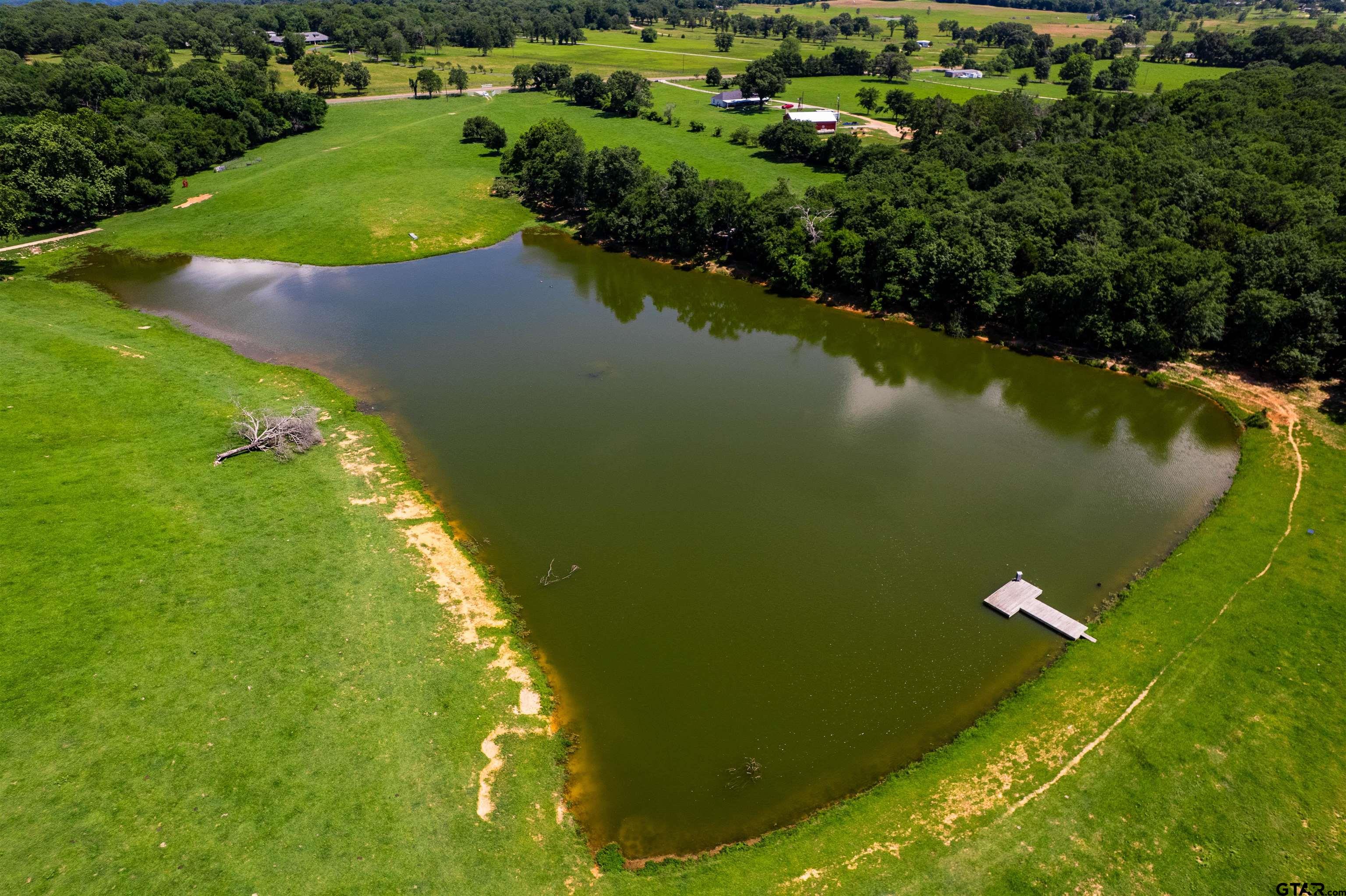 8970 Fm 59 Athens, TX 75751 - Photo 11 of 14 a view of a lake with a yard