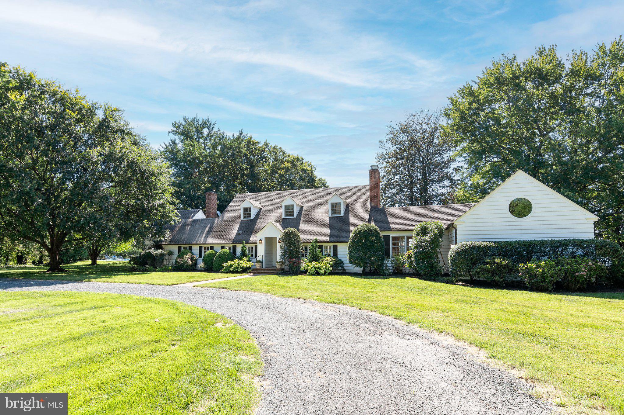 4471 World Farm Road Oxford, MD 21654 - Photo 2 of 42 Charming home nestled in lush greenery.