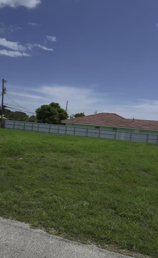2620 Donald Road Palm Springs, FL 33406 - Photo 3 of 3 a view of a grassy field