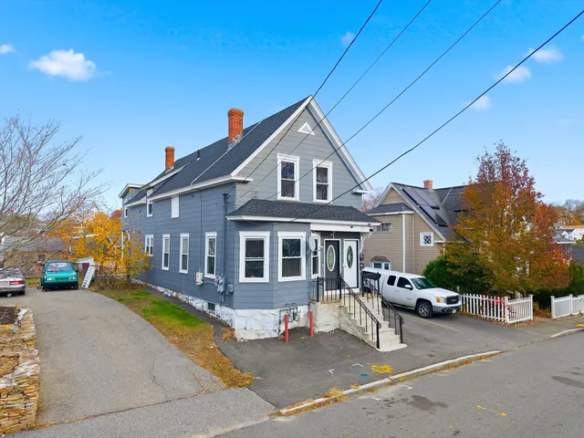 a view of a street with cars