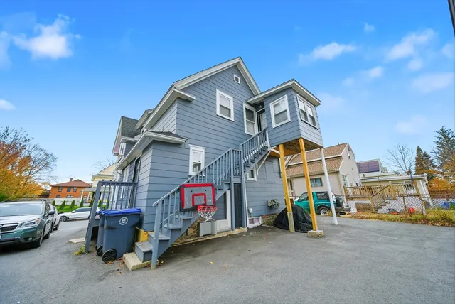 an aerial view of residential houses with outdoor space