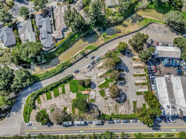 an aerial view of residential house with outdoor space