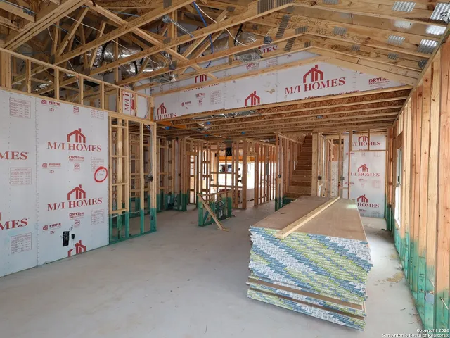a view of a room with wooden walls
