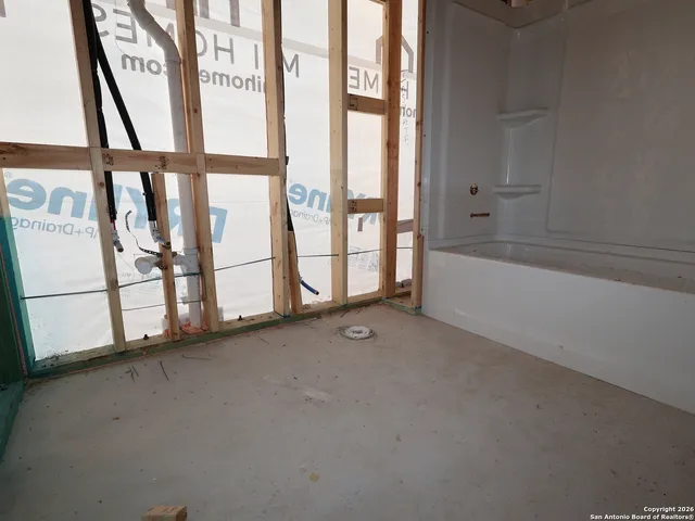 a front view of a house with parking area