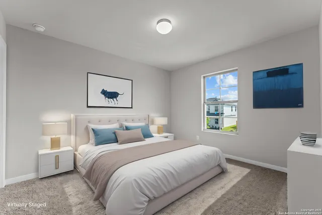 a kitchen with kitchen island granite countertop a sink and cabinets