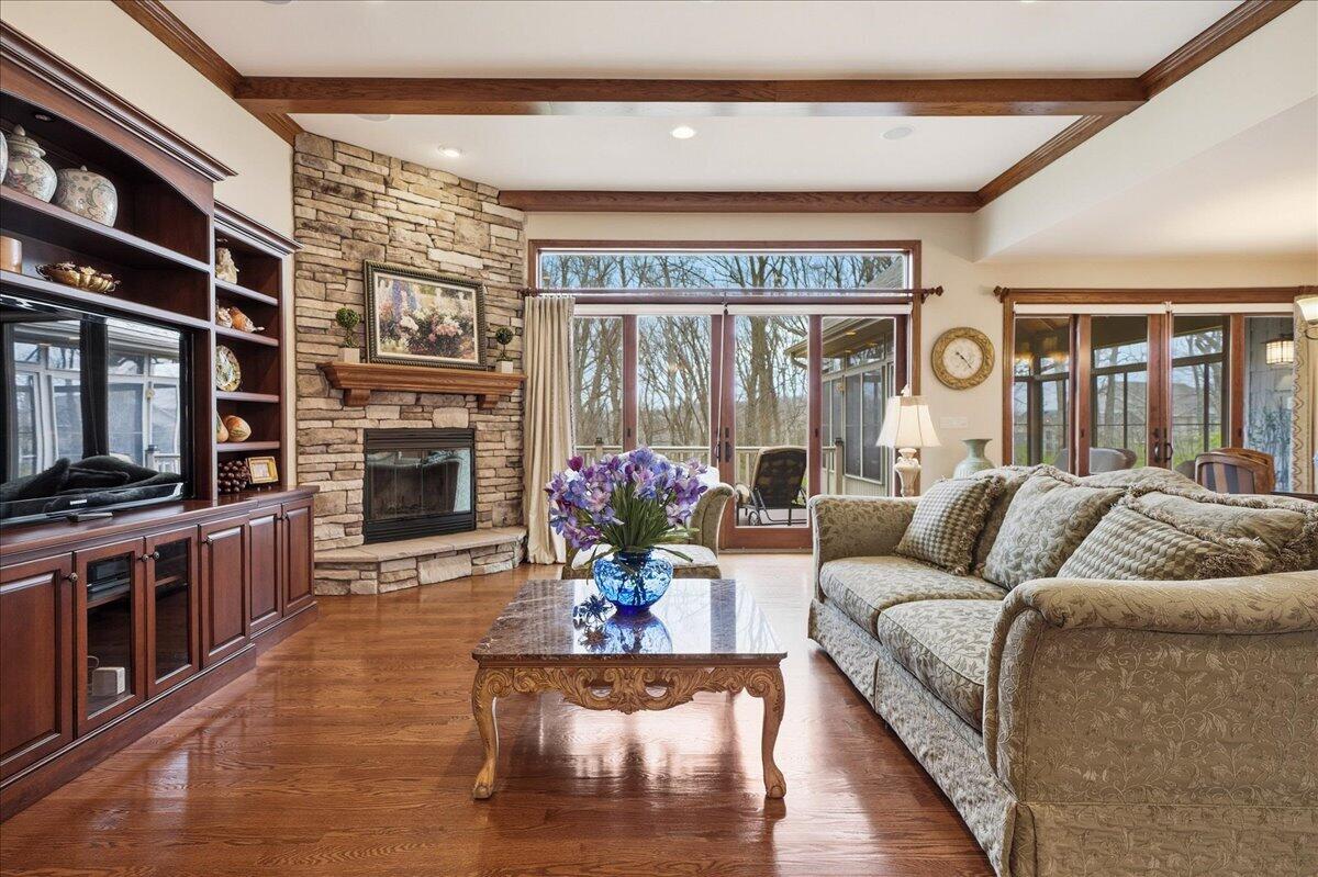 770 Quinlan Court Crown Point, IN 46307 - Photo 14 of 57 a living room with furniture fireplace and flat screen tv