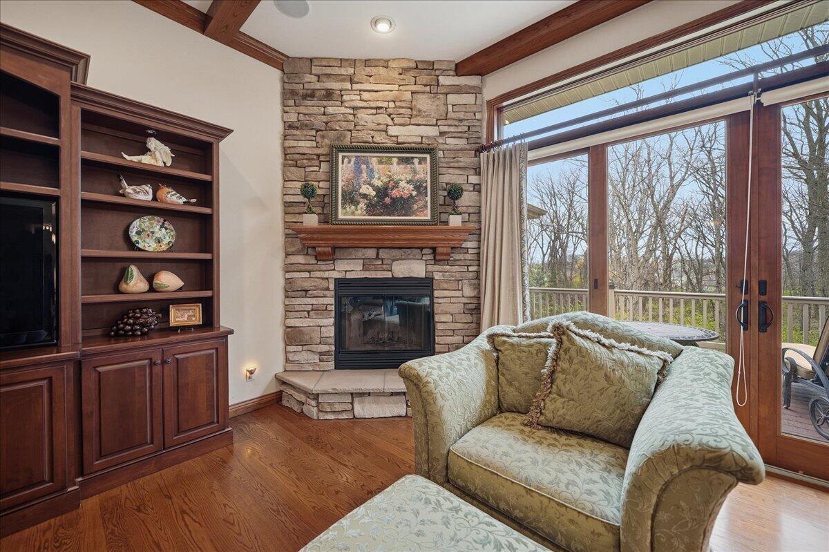 770 Quinlan Court Crown Point, IN 46307 - Photo 15 of 57 a living room with furniture and a fireplace