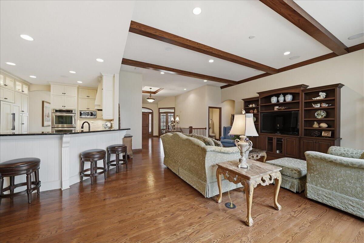 770 Quinlan Court Crown Point, IN 46307 - Photo 16 of 57 a living room with furniture and a large window