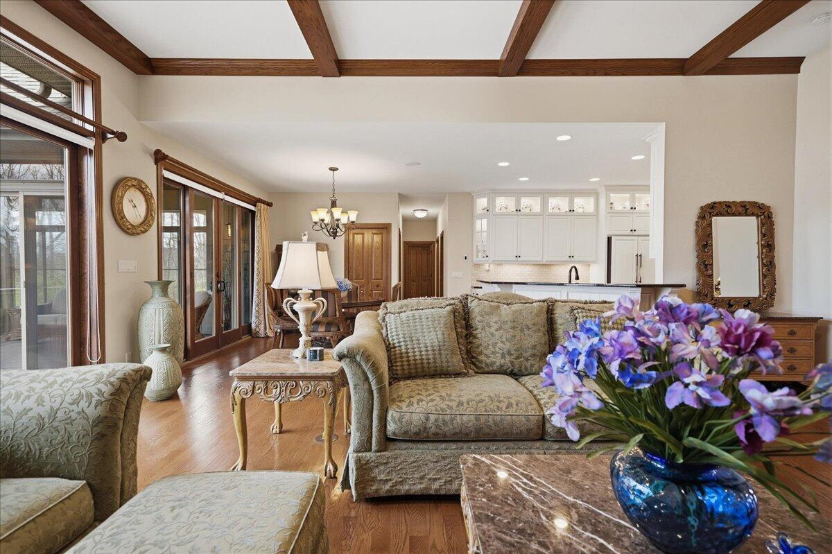 770 Quinlan Court Crown Point, IN 46307 - Photo 17 of 57 a living room with furniture flowerpot and a rug