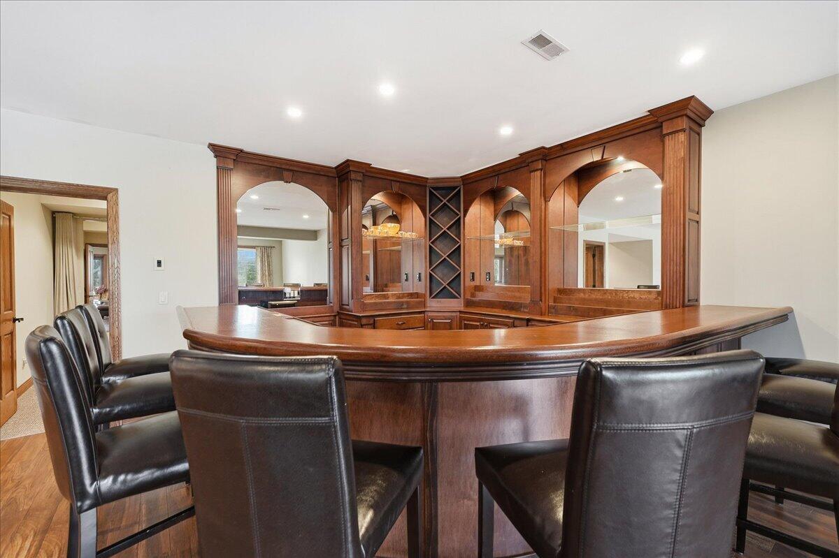 770 Quinlan Court Crown Point, IN 46307 - Photo 34 of 57 a kitchen with a sink and chairs