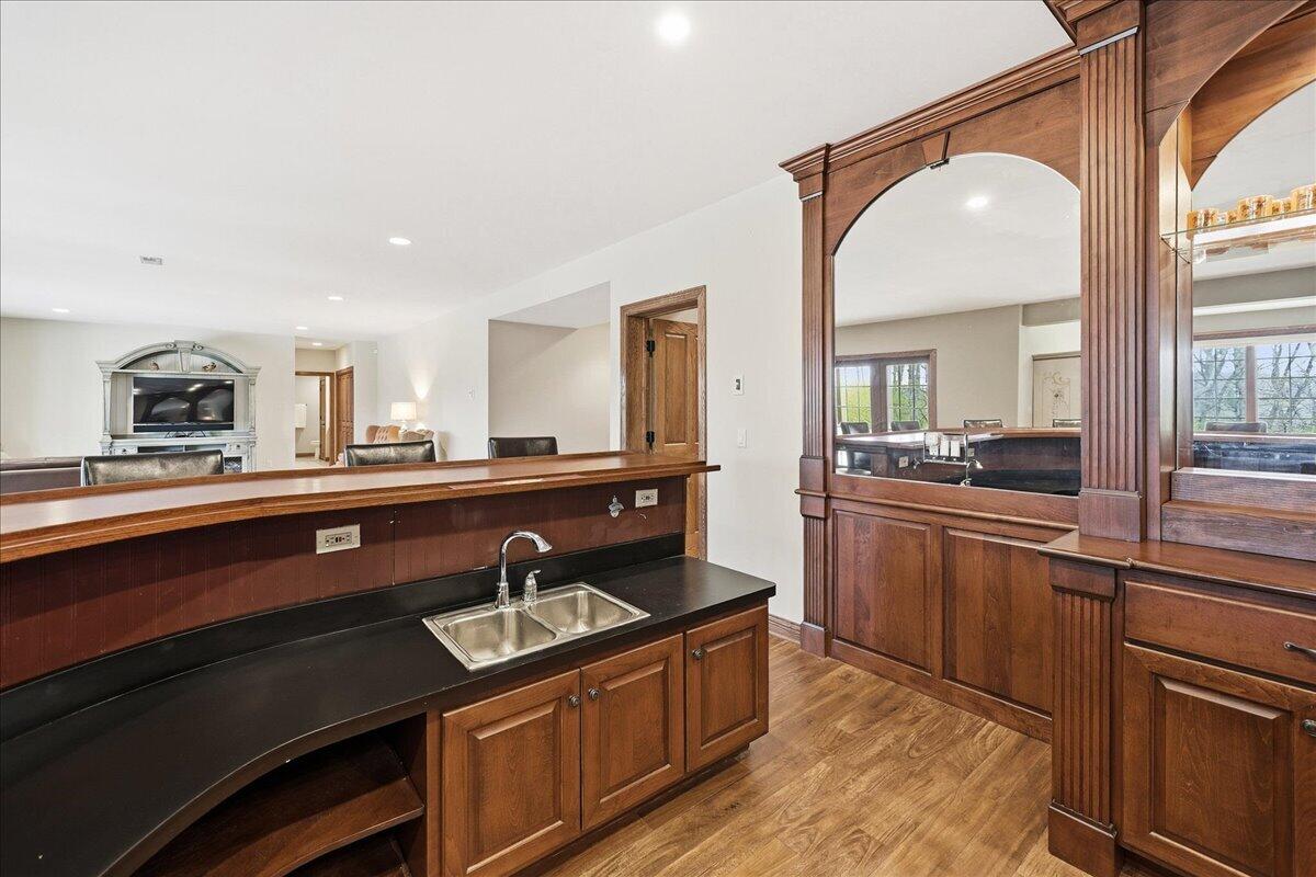 770 Quinlan Court Crown Point, IN 46307 - Photo 35 of 57 a kitchen with stainless steel appliances granite countertop a sink and cabinets