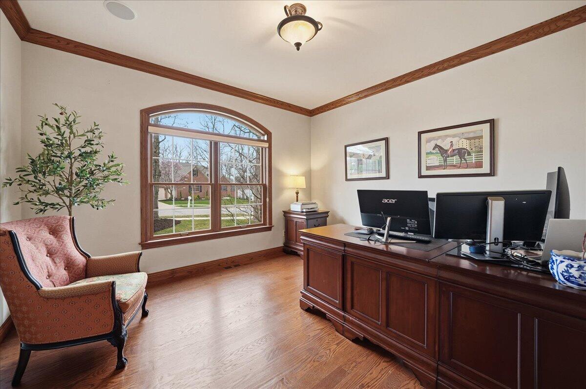 770 Quinlan Court Crown Point, IN 46307 - Photo 8 of 57 a living room with furniture and a flat screen tv