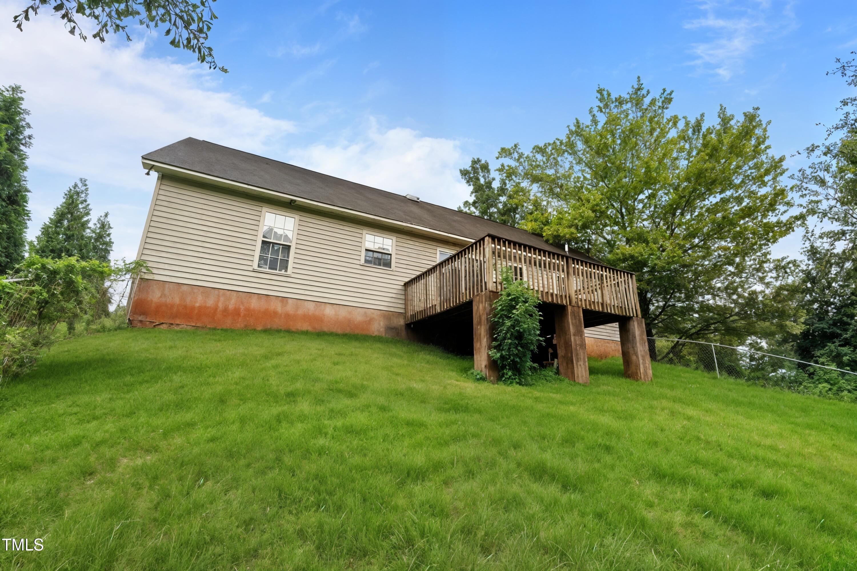 1506 Rollins Store Road Sanford, NC 27332 - Photo 5 of 37 10-web-or-mls-DSC03396_grass_bec359a6-c8