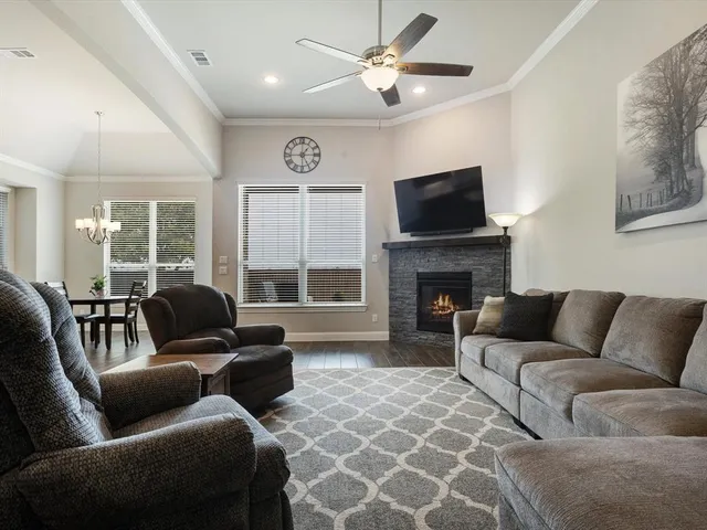 a kitchen with a stove a sink and a refrigerator