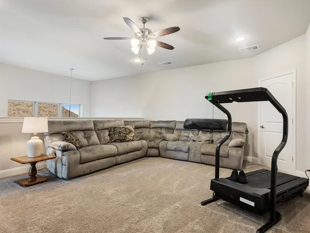 a bathroom with a sink toilet and mirror