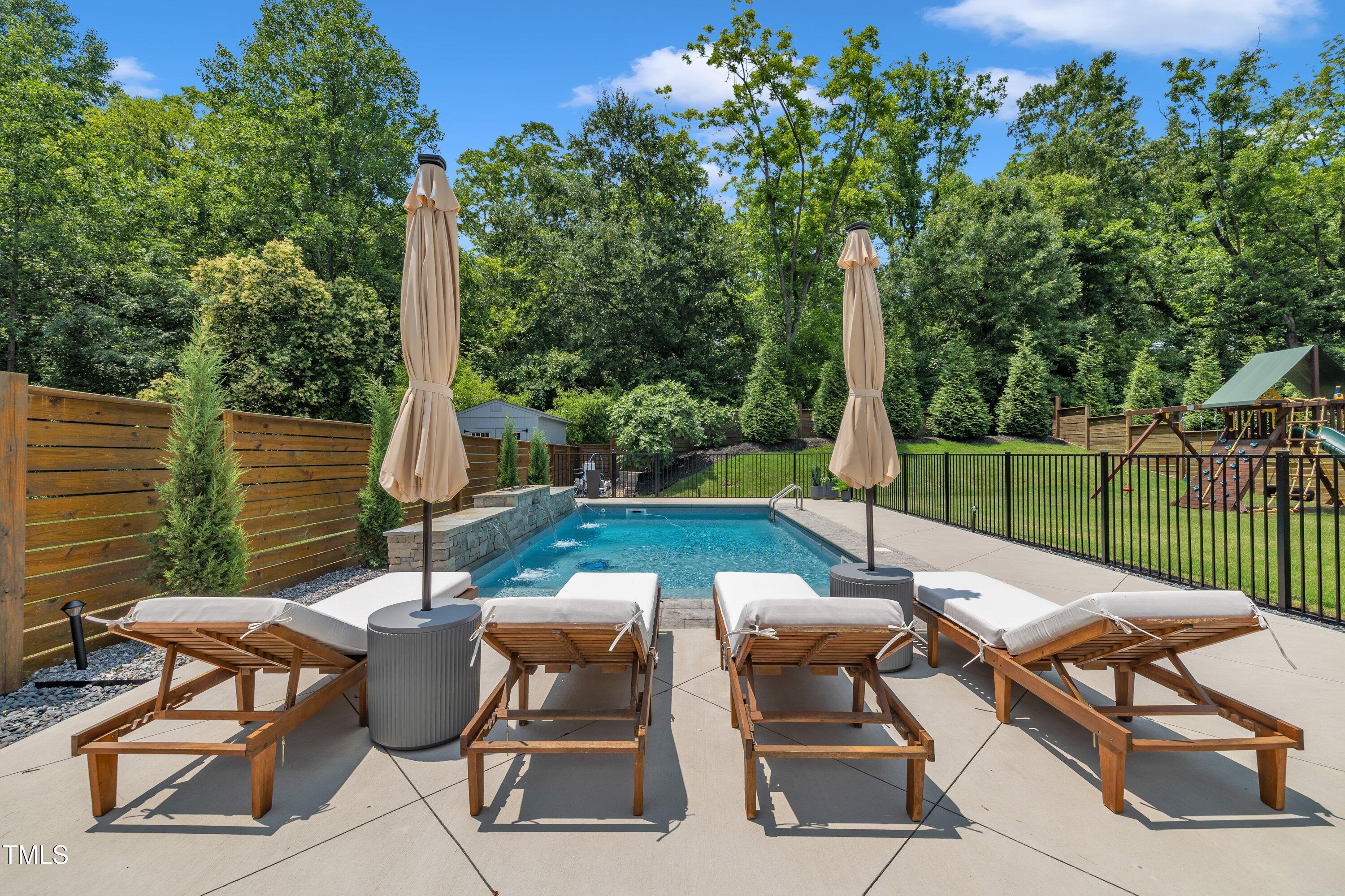 800 Wilcox Street Raleigh, NC 27607 - Photo 40 of 43 a view of a patio with a table chairs and a table