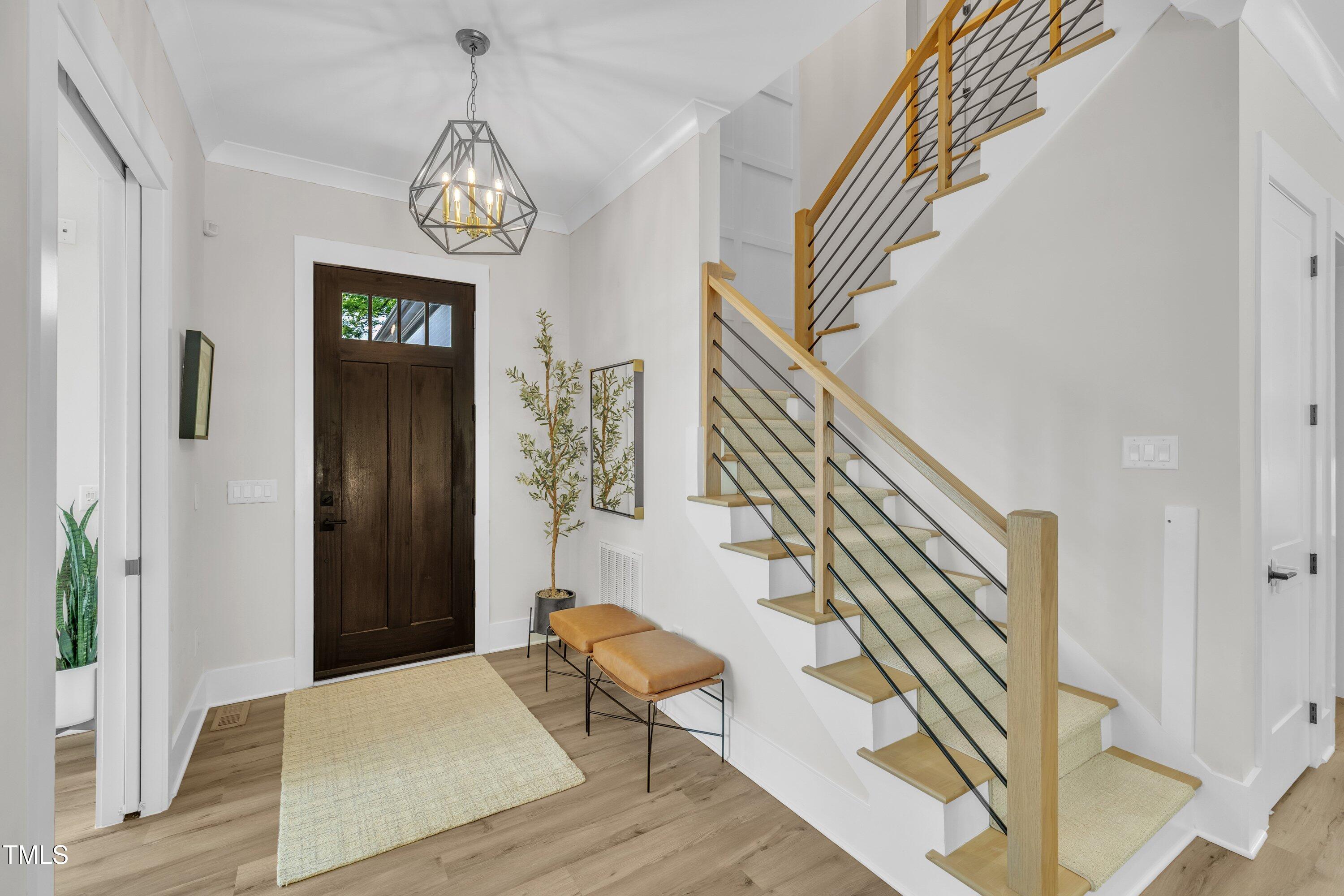 800 Wilcox Street Raleigh, NC 27607 - Photo 4 of 43 a view of entryway and hall with wooden floor