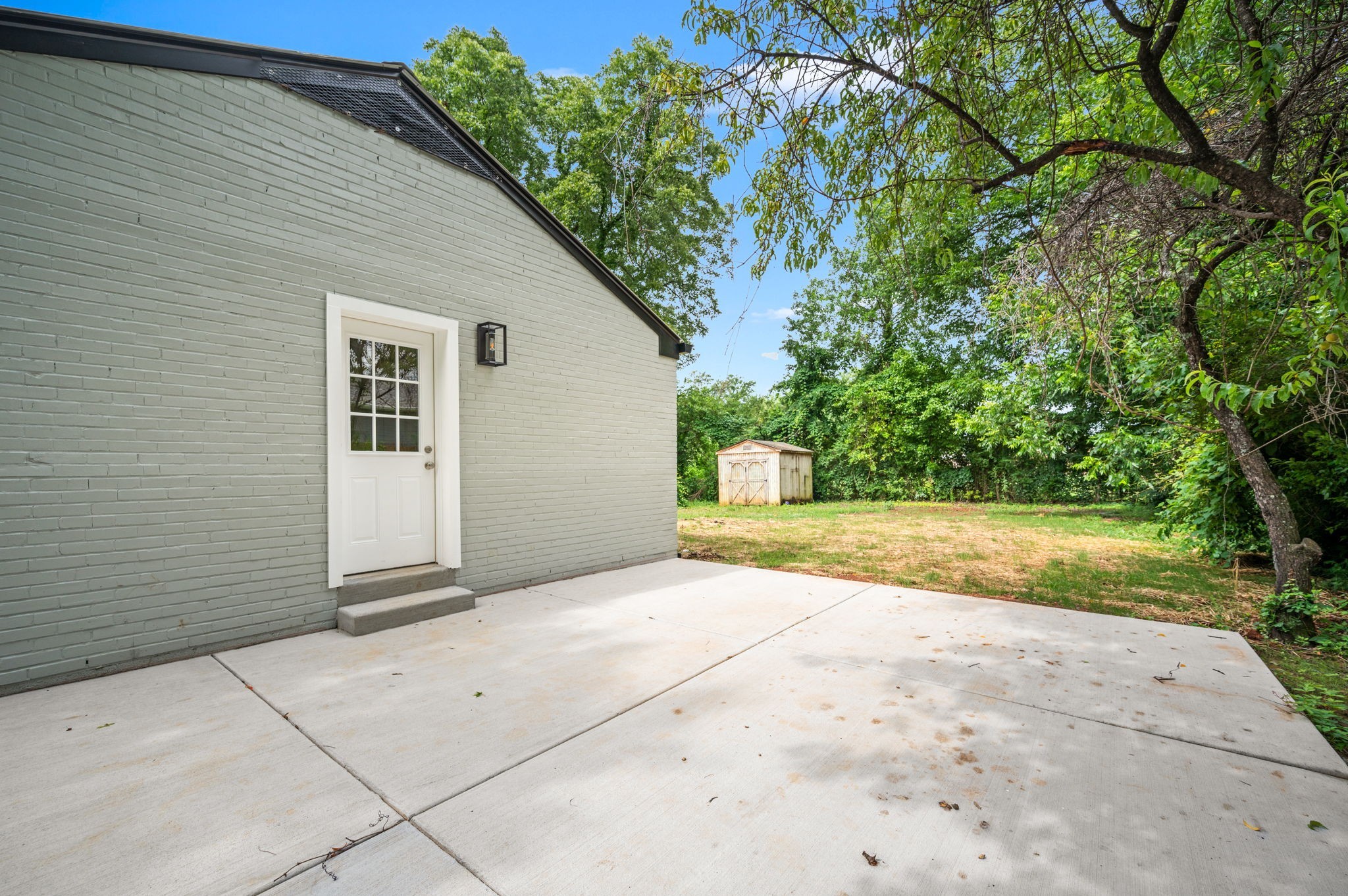 706 Mars Street Murfreesboro, TN 37130 - Photo 17 of 17 a view of backyard with large trees