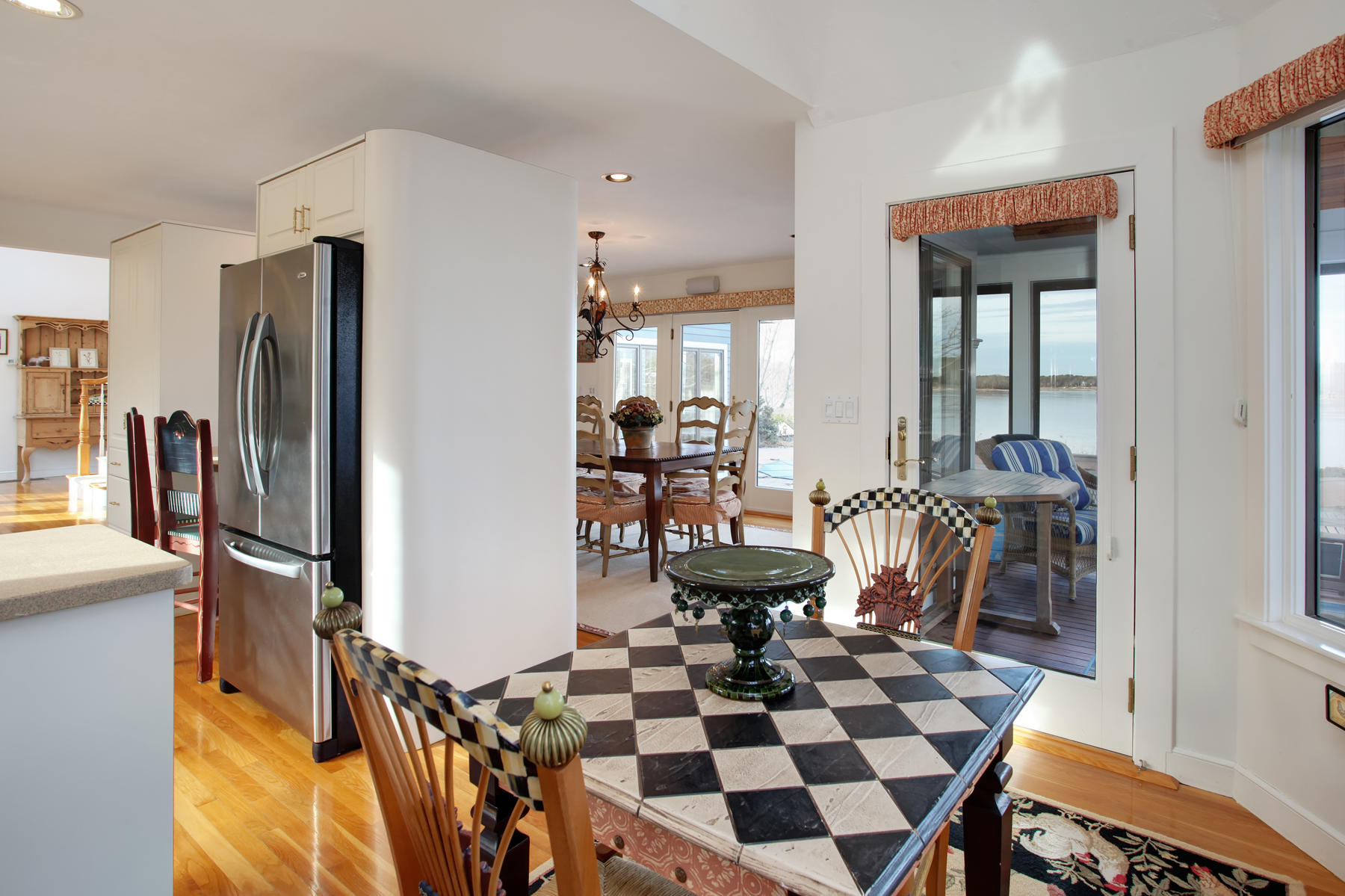 43 Tide Run Mashpee, MA 02649 - Photo 14 of 31 a view of a dining room with furniture and chandelier