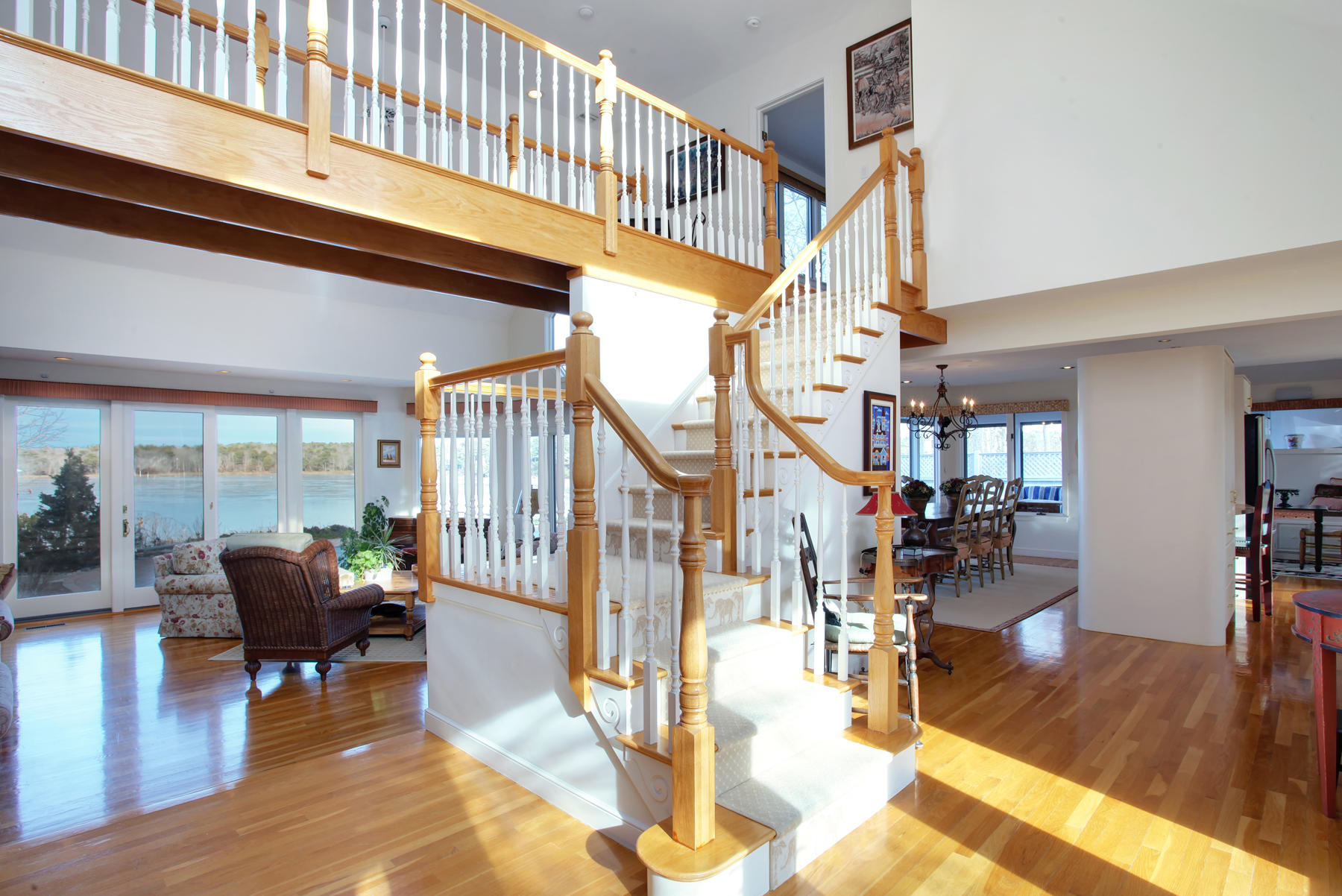 43 Tide Run Mashpee, MA 02649 - Photo 21 of 31 a living room with lots of furniture and wooden floor