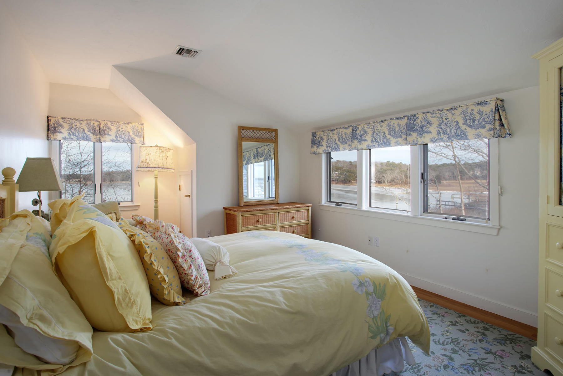 43 Tide Run Mashpee, MA 02649 - Photo 27 of 31 a bed sitting in a bedroom next to a window