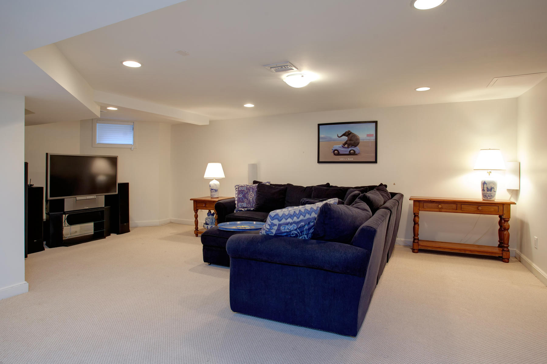 43 Tide Run Mashpee, MA 02649 - Photo 30 of 31 a living room with furniture and a flat screen tv