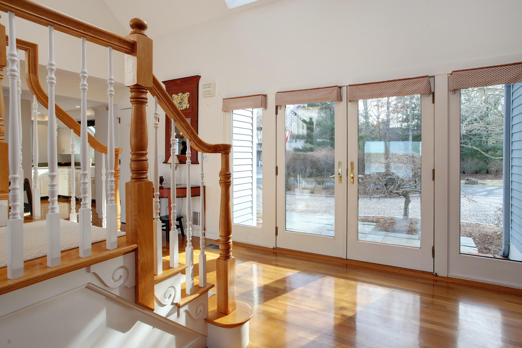43 Tide Run Mashpee, MA 02649 - Photo 6 of 31 a view of an entryway with wooden floor and door