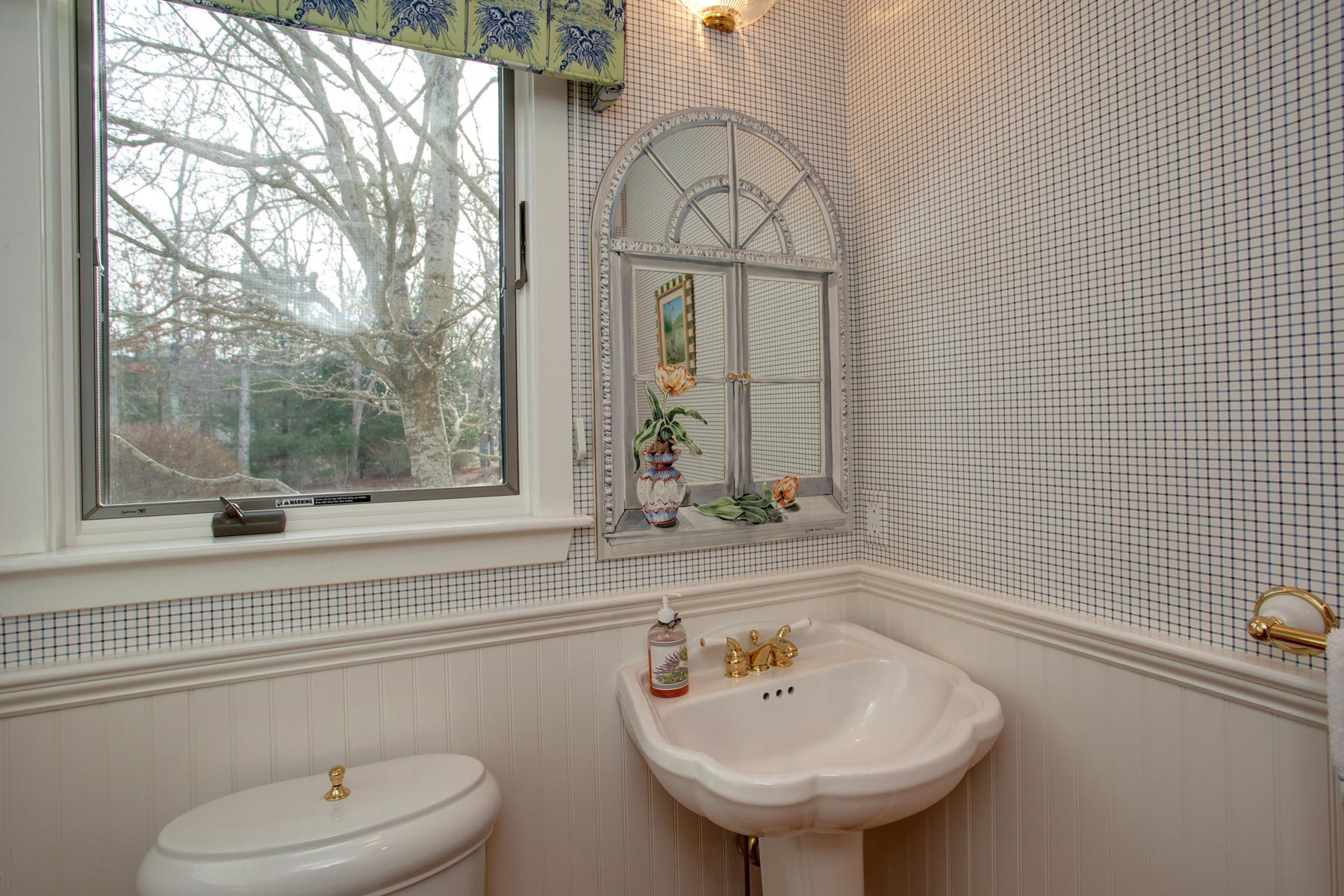 43 Tide Run Mashpee, MA 02649 - Photo 7 of 31 a bathroom with a sink a toilet and a mirror