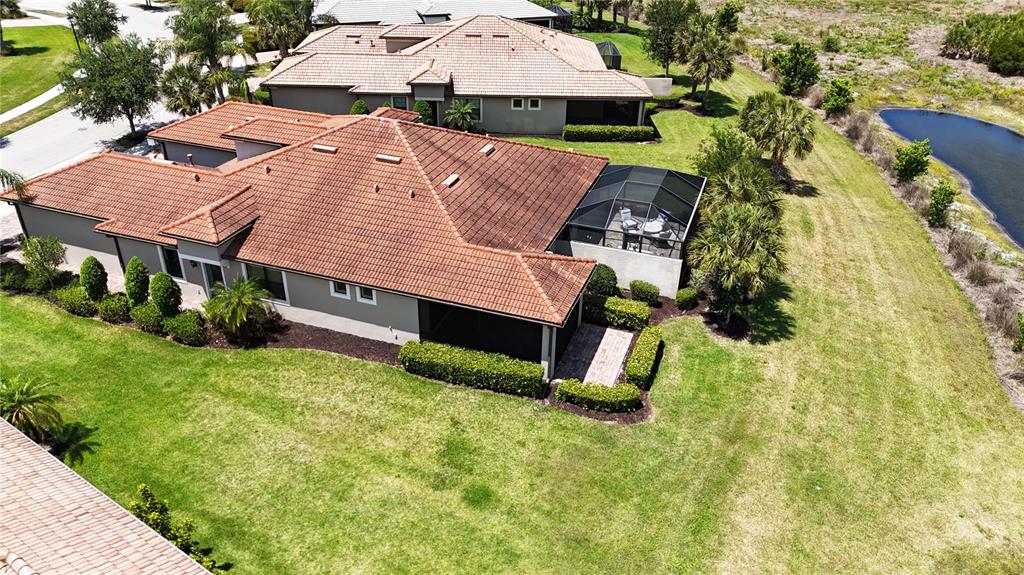 12276 Marsh Pointe Road Sarasota, FL 34238 - Photo 34 of 48 an aerial view of a house with swimming pool and porch