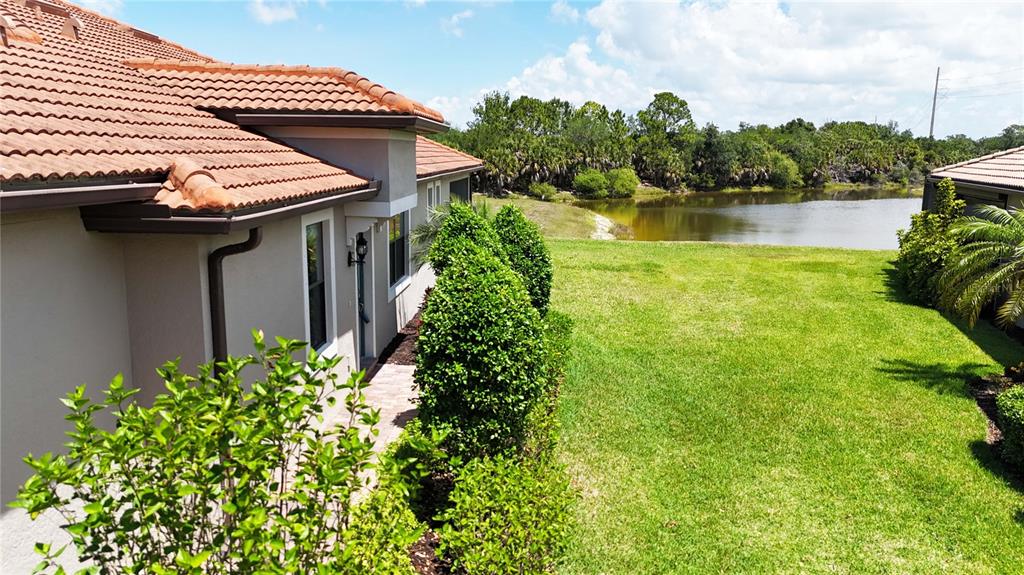 12276 Marsh Pointe Road Sarasota, FL 34238 - Photo 6 of 48 a view of a garden with lake view