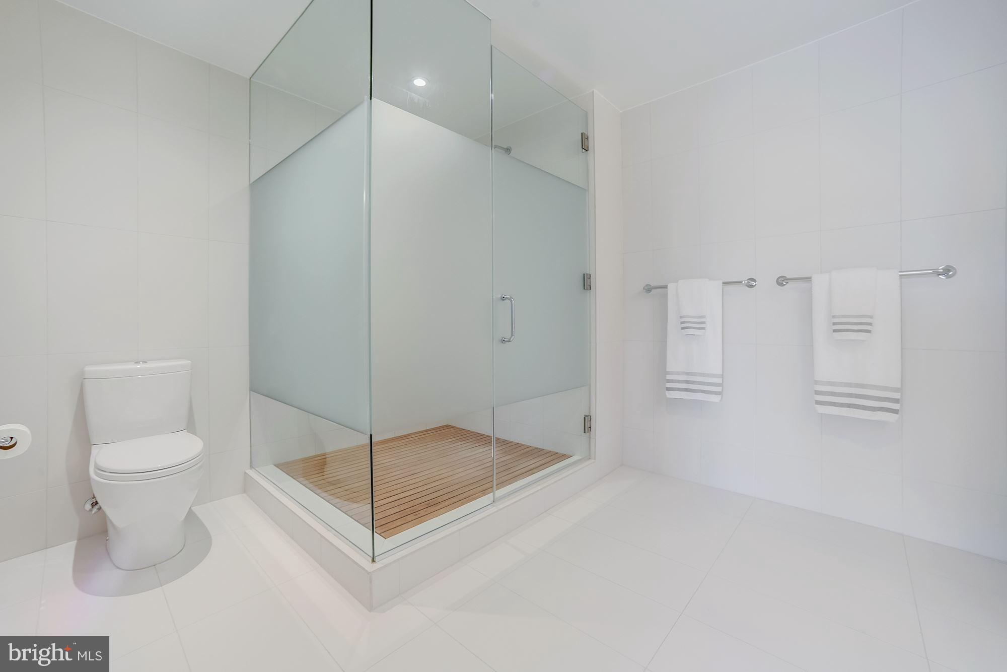 1111 24th Street Northwest, Unit 84 Washington, DC 20037 - Photo 11 of 17 Primary bath with IPE teak flooring