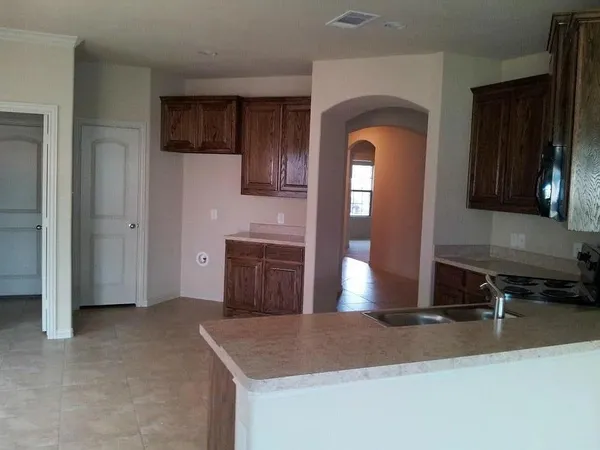 a view of kitchen and utility room