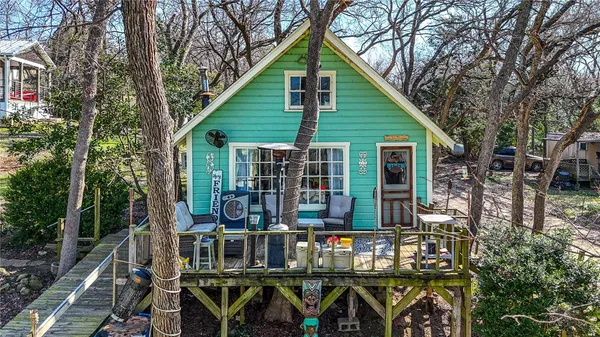 a kitchen with stainless steel appliances granite countertop a refrigerator and a stove