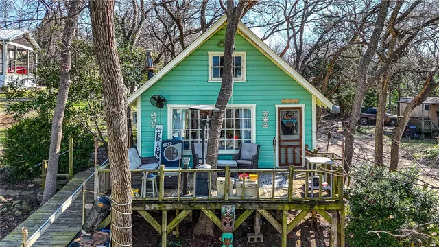 a kitchen with stainless steel appliances granite countertop a refrigerator and a stove