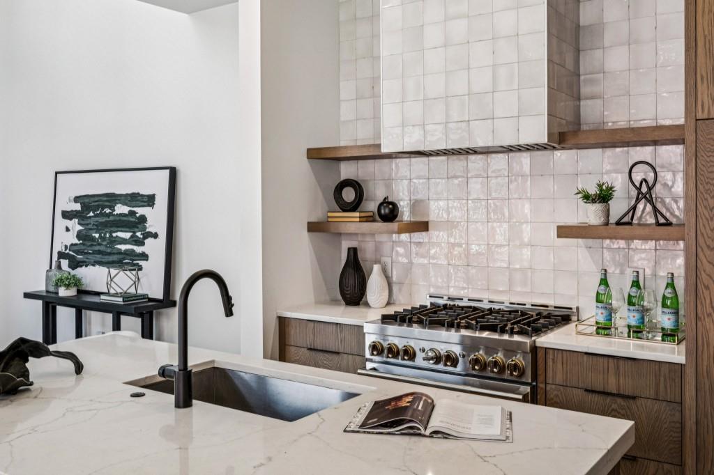 536 Highland Avenue Northeast, Unit A Atlanta, GA 30312 - Photo 14 of 51 a kitchen with a stove and a sink