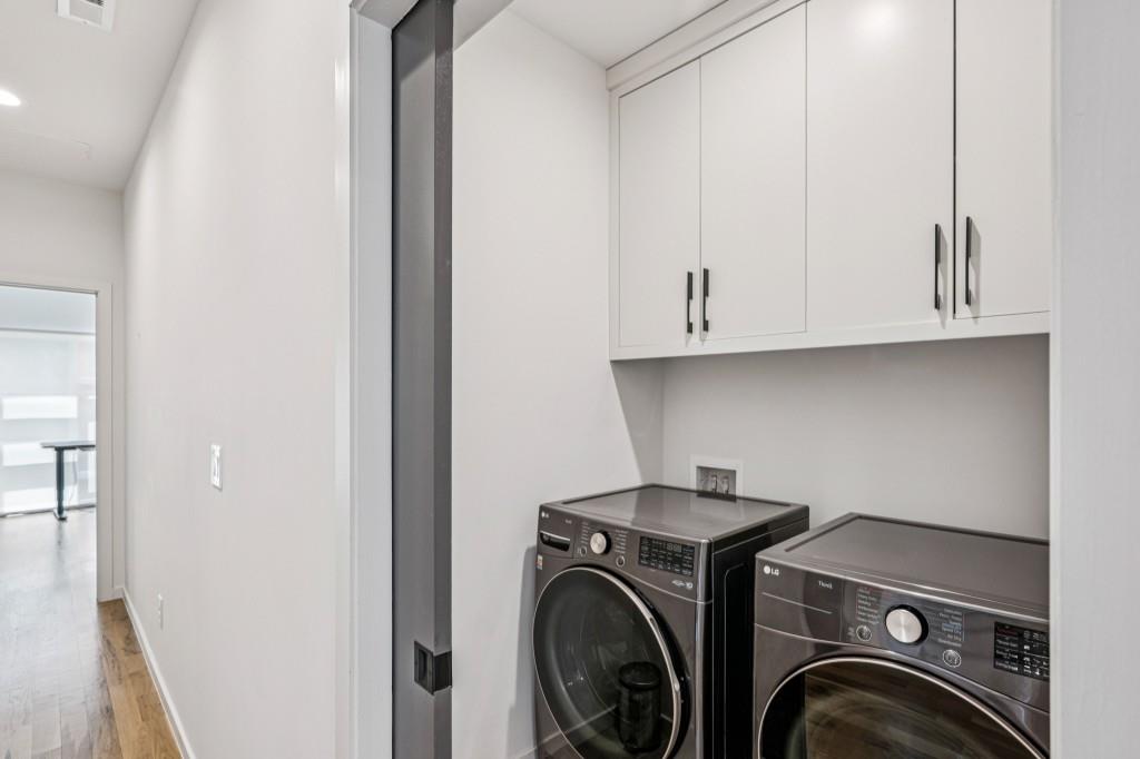 536 Highland Avenue Northeast, Unit A Atlanta, GA 30312 - Photo 30 of 51 a utility room with dryer and washer