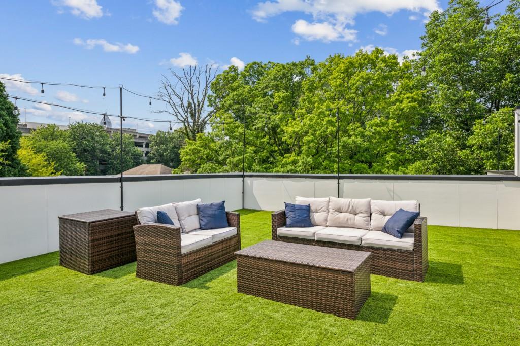 536 Highland Avenue Northeast, Unit A Atlanta, GA 30312 - Photo 36 of 51 a view of a bench in the back yard